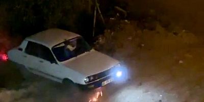 KAHRAMANMARAŞ’TA ARACI ALEV ALAN SÜRÜCÜ SON ANDA KURTARILDI