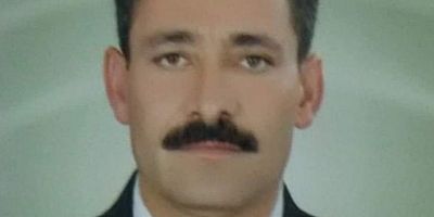 MAHALLE MUHTARI TARLASINDA ÖLÜ BULUNDU